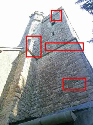 Eroded stonework on the tower