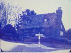 Dove Cottage (where the bottom of Ewell Lane intersects Lower Road) probably between 1900 and 1914, covered in ivy.