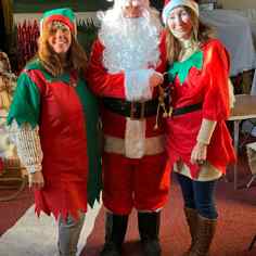 Santa and with elf Sue and elf Tracy